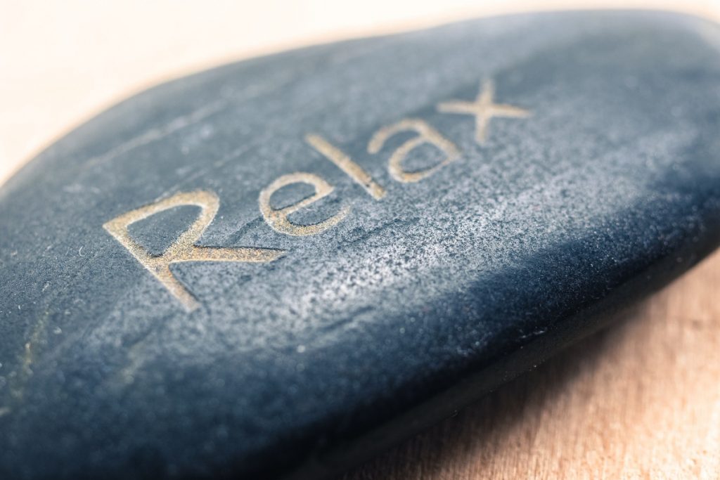 Carving of the word relax